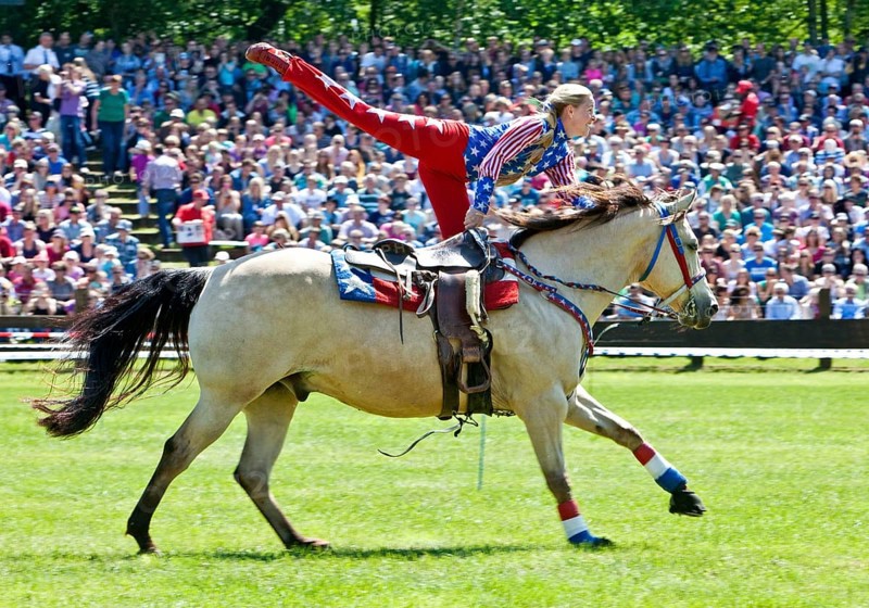 Trick riding in an arena