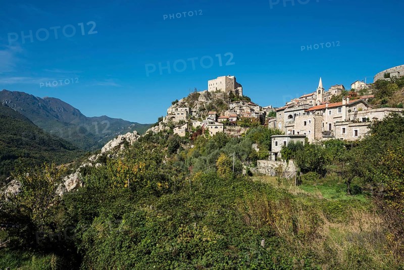 Medieval village with a castle in the mountains