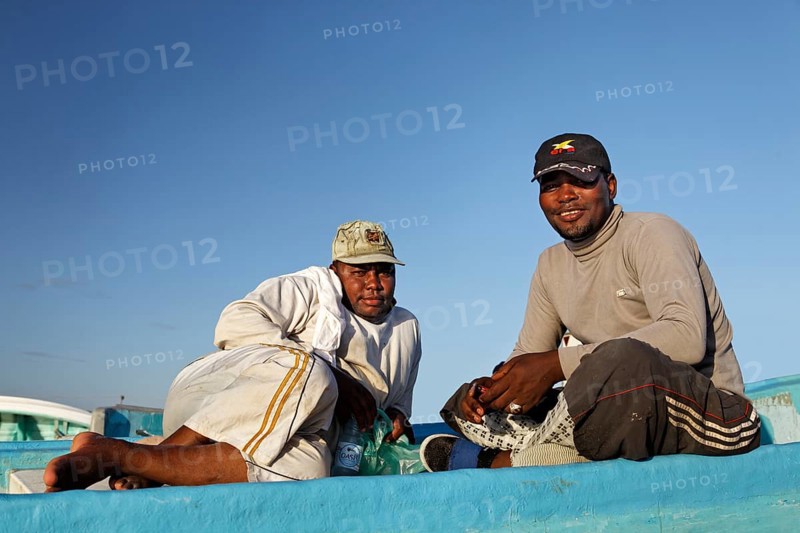 Omani fishermen on a fishing boat