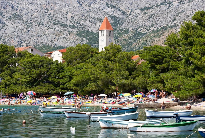 Fishing boats off bathing beach