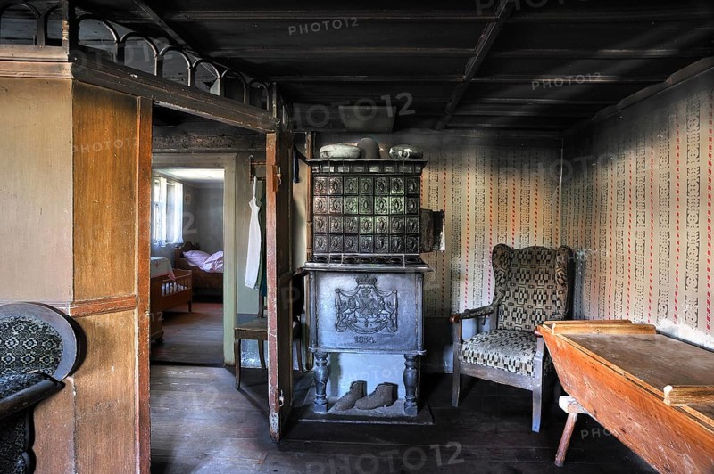 Parlour with a tiled stove