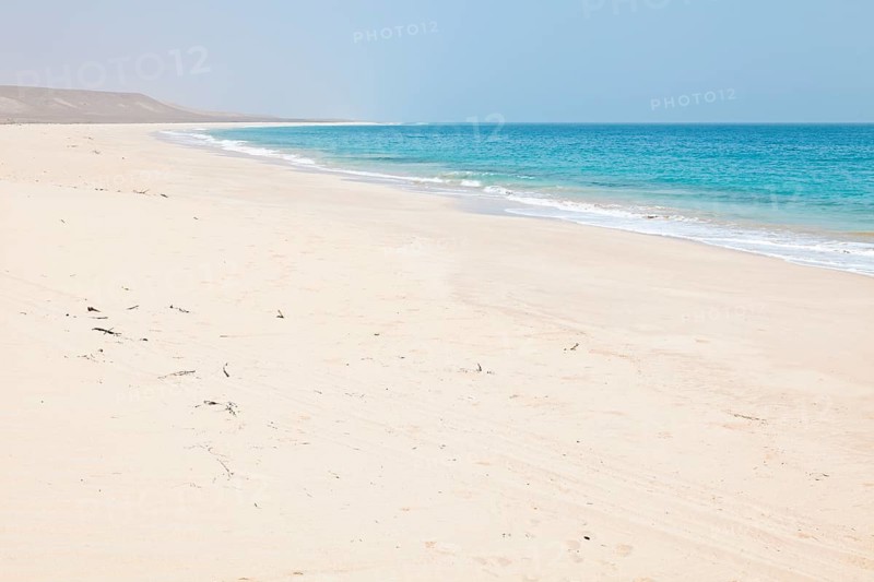 The long and wide beach of Praia de Curral Velho in the south of the island of Boa Vista
