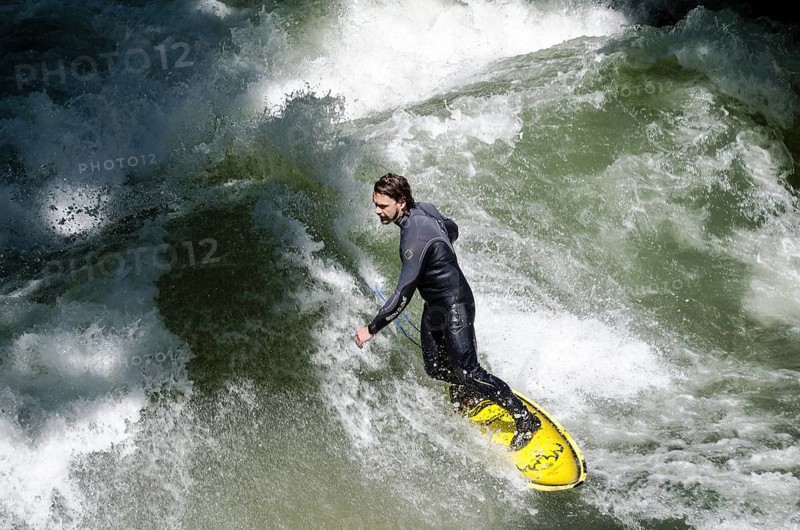 Surfer surfing the Eisbach stream