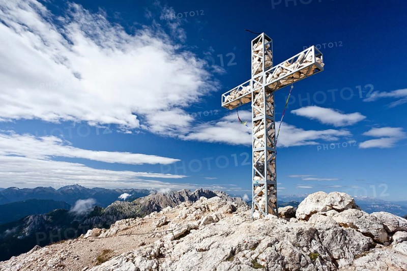 Summit cross of Croda Rossa or Sextener Rotwand in the Rosengarten Group