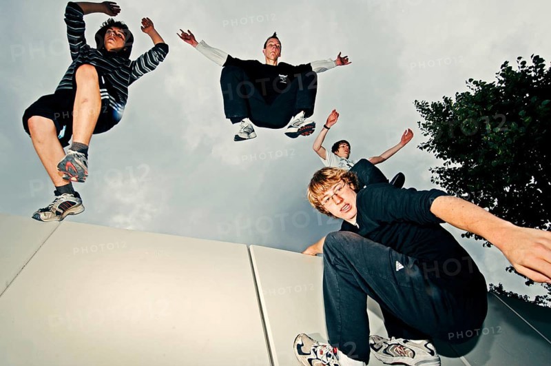 A group of freerunners jumping
