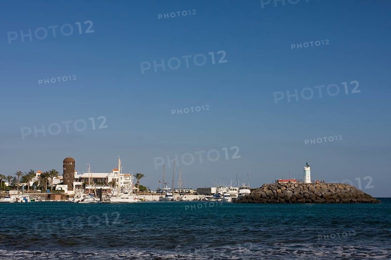 Marina with lighthouse in Caleta de Fuste