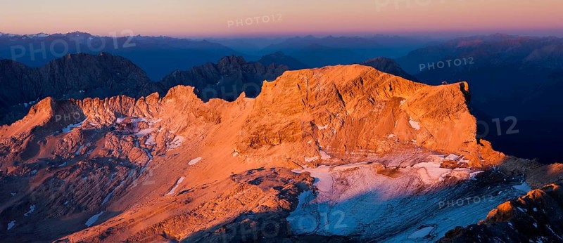 Sunrise view from Mt Zugspitze to Mt Schneefernerkopf