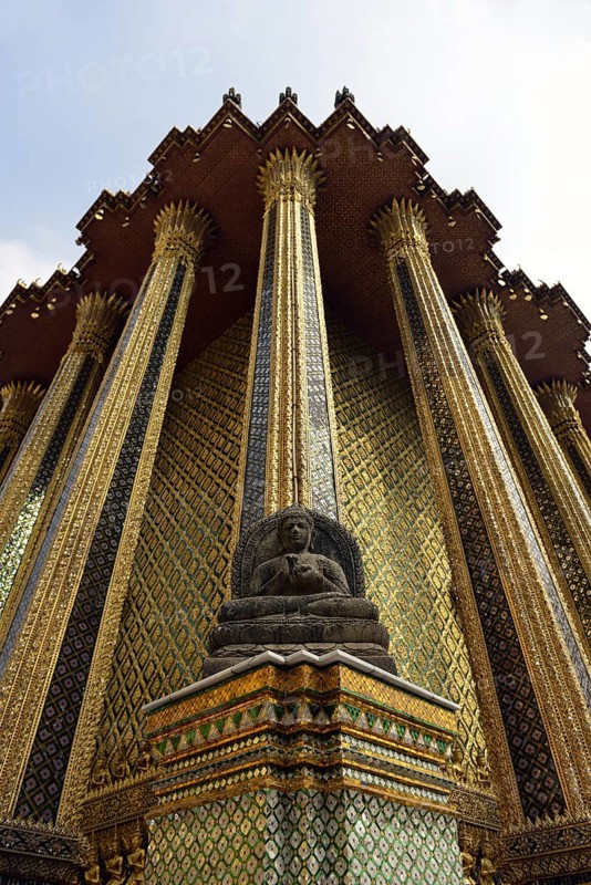Buddha statue in front of the Mondop