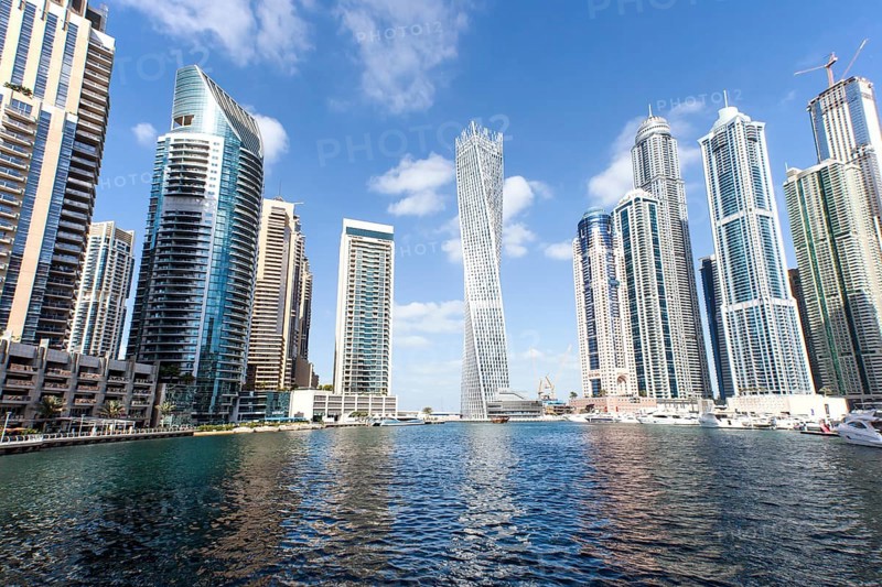Cayan Tower and skyscrapers with marina