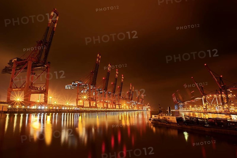 Waltershoferdamm 2 with the cranes of Container Terminal Burchardkai and EUROGATE Container Terminal