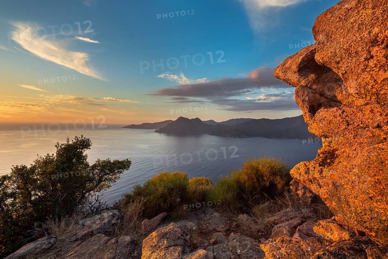 Bizarre rock erosions at the Gulf of Porto in the evening light
