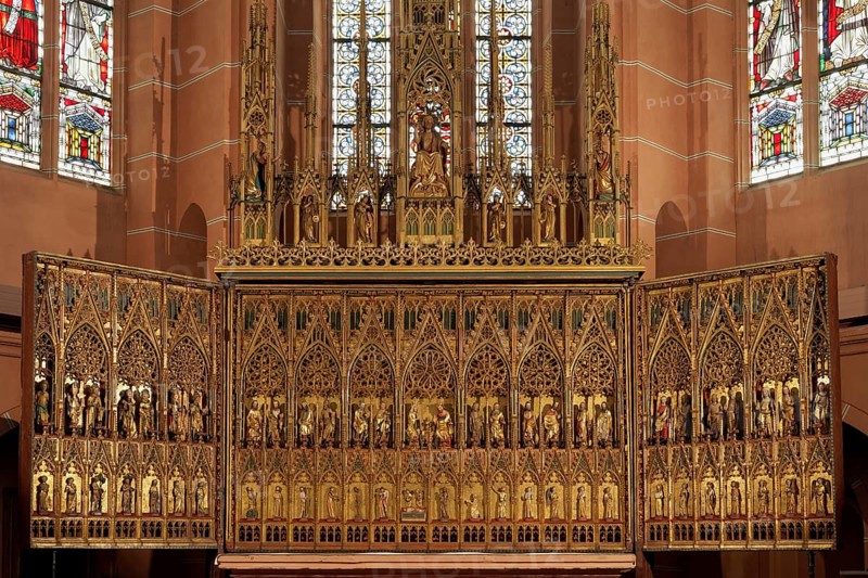 Gothic winged altar with wood carvings and figures