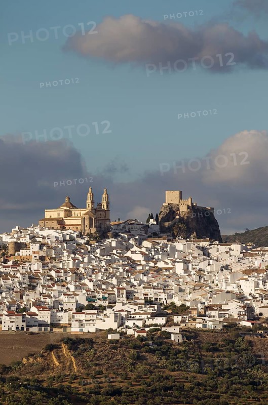 The hilltop White Town of Olvera with La Encarnacion church and the Moorish castle
