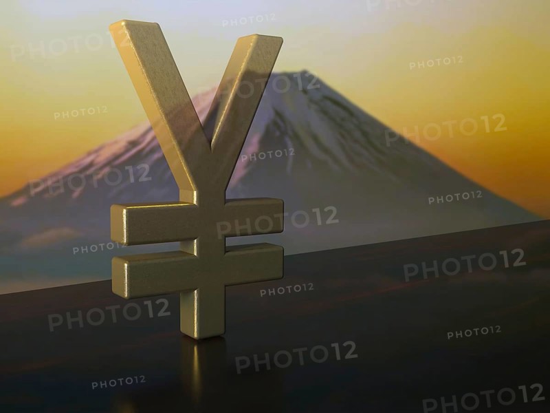 Yen currency symbol made of bronze on ebony