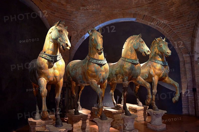 Four bronze horses