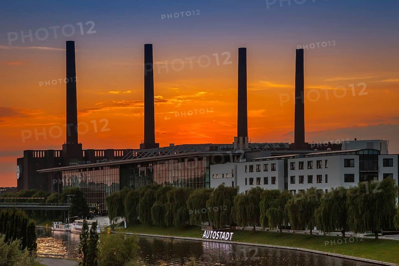 VW KonzernForum premises with the entrance to the Autostadt complex and the heating station of the Volkswagen plant with its four chimneys