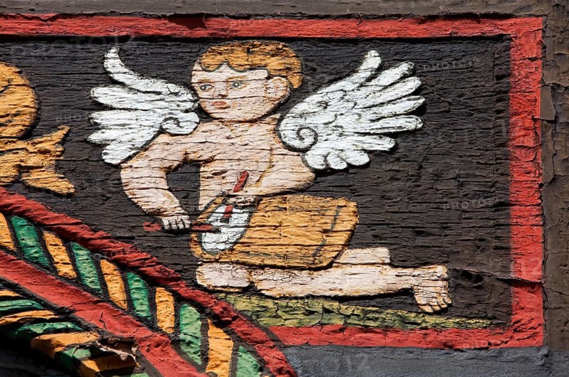 Angel with drums on a half-timbered house