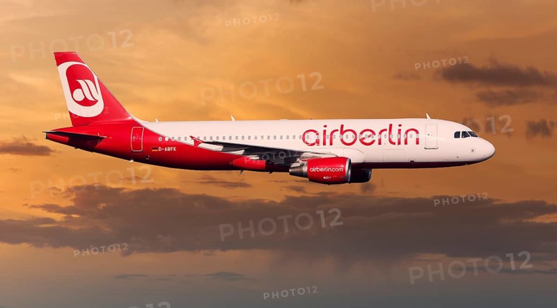 Air Berlin Airbus A320-214 in flight at night