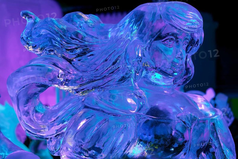 Female figure with flowing hair made of ice