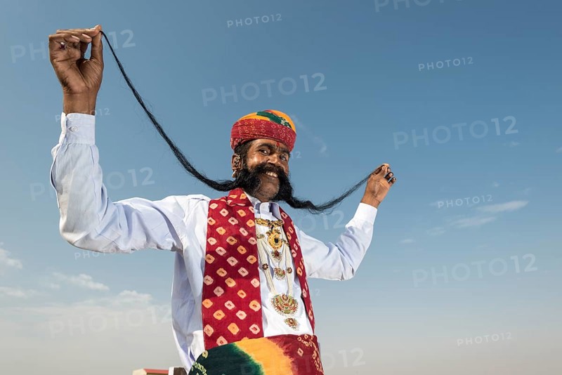 Local man presenting his long mustache