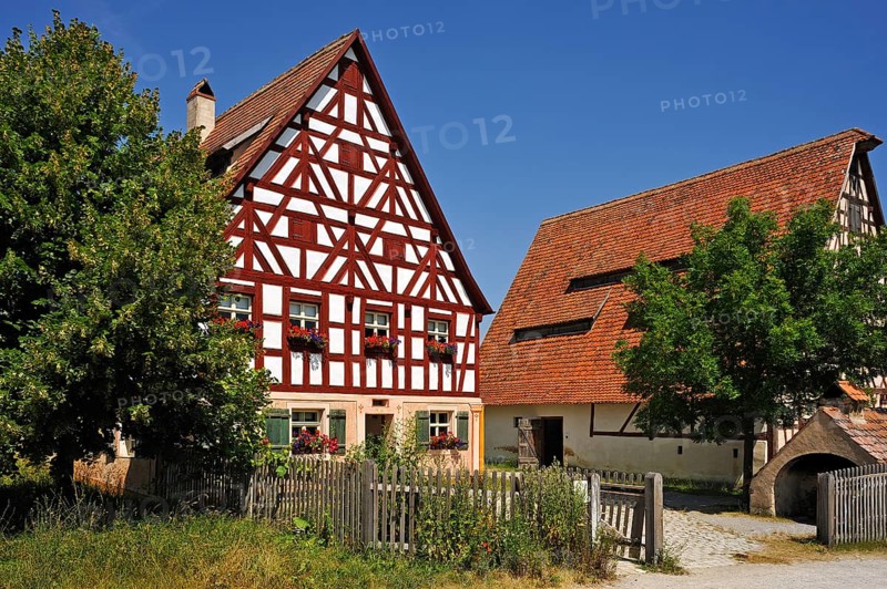 Half-timbered farmhouse on stone base