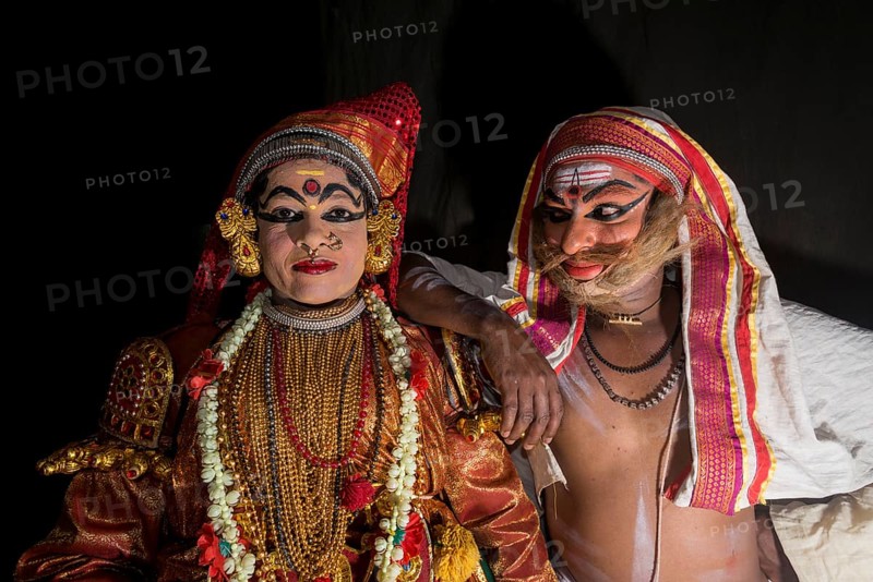 Two Katakali artists with the complete make up of the characters Sathi
