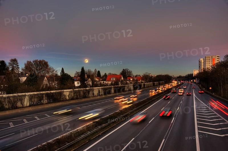 A96 motorway at dusk with light trails of moving cars