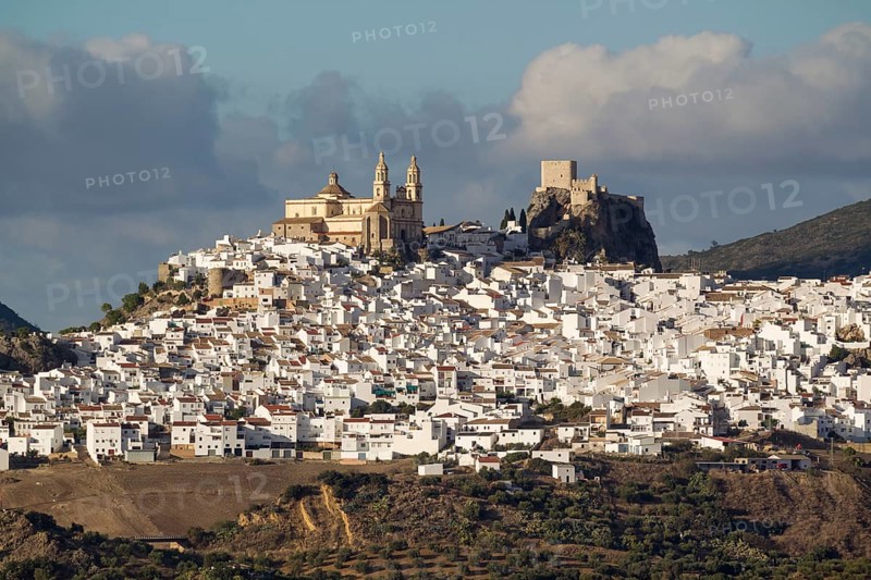 The hilltop White Town of Olvera with La Encarnacion church and the Moorish castle