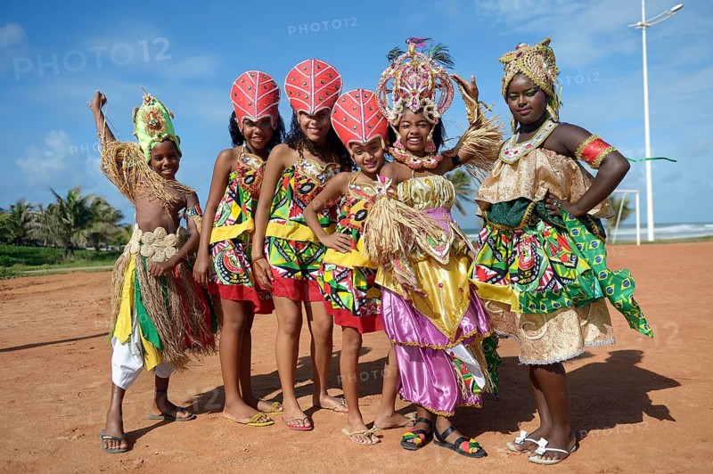 Colourfully dressed children of a traditional Afro-Brazilian musical group
