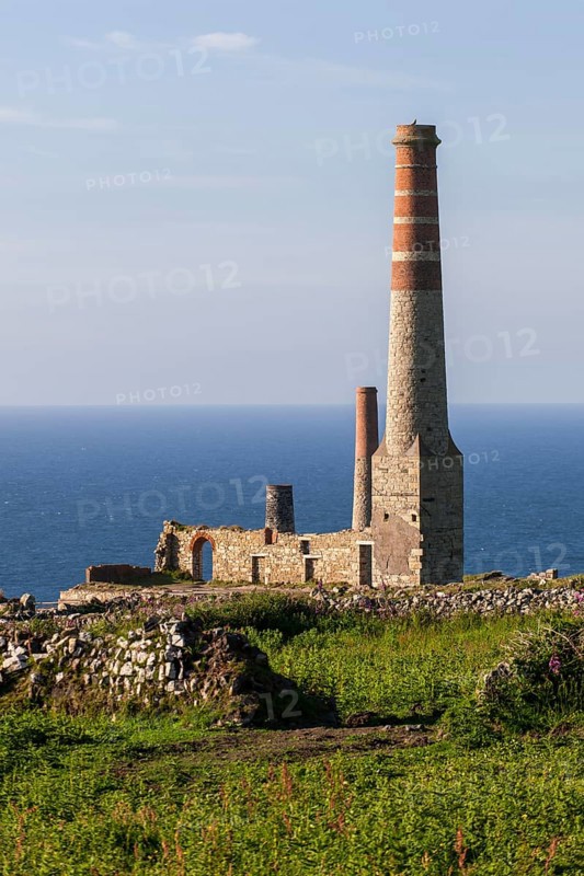 Ruins and chimney of the crushing plant of the former tin and copper mine Levant Mine