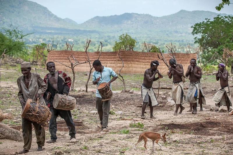 Men of the Koma people with instruments
