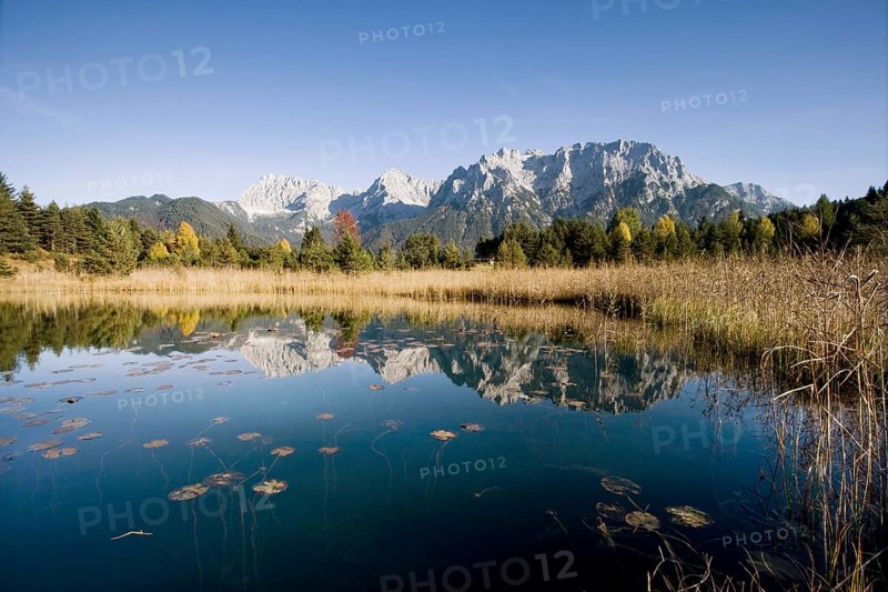 The Northern Karwendel chain in autumn reflected in Luttensee