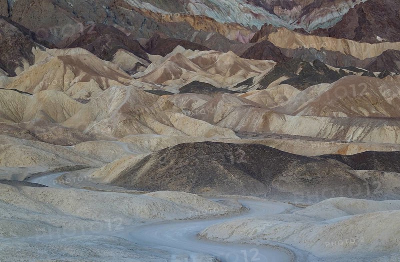 Road through the badlands of the 'Twenty Mule Team Canyon' at dawn