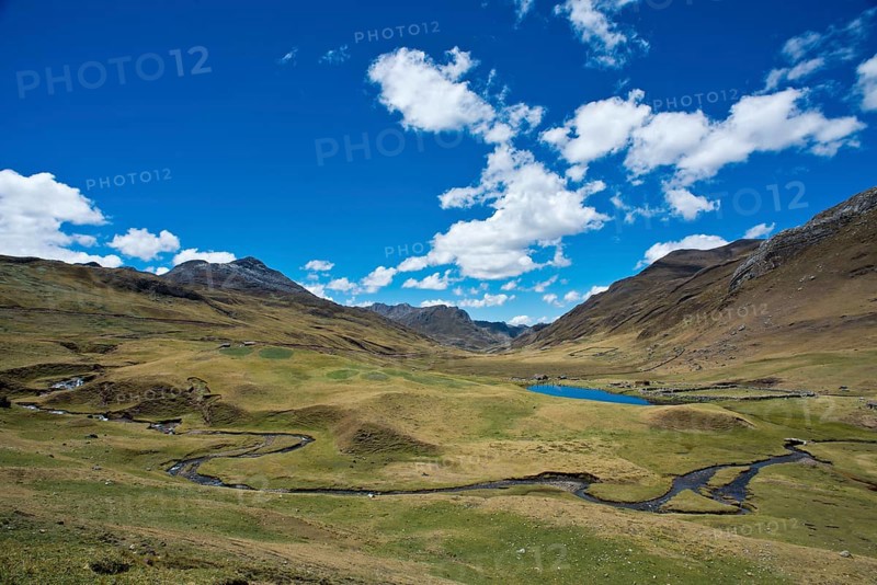 Mountain valley with river and small lake
