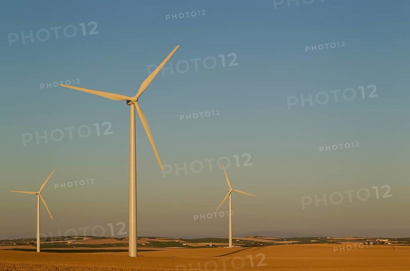 Windmills in the evening light on a wind farm near Sanlucar de Barrameda