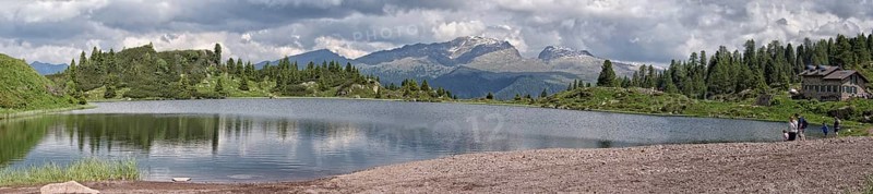 Panoramic view of the largest Colbricon lake from the riverside
