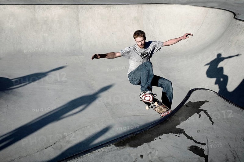Skateboarder skating in a skate pool