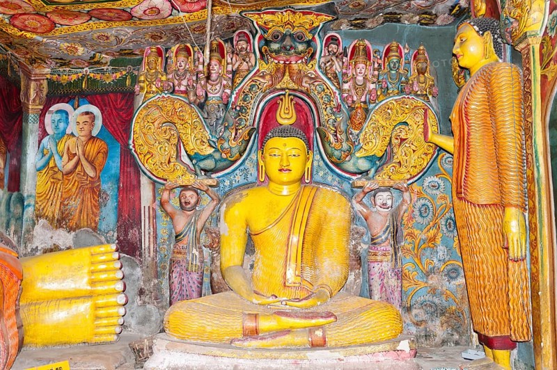 Brightly painted and richly decorated Buddha figure