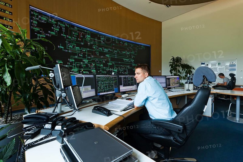 Engineer sitting at his work station in the Transmission Control Center