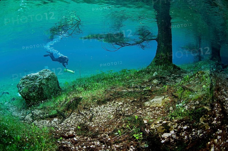 Scuba diver with a scooter