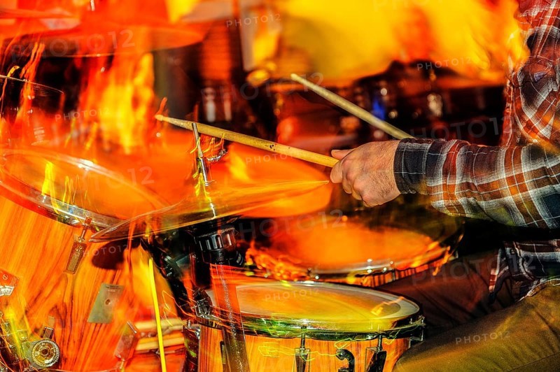 Hands of a drummer playing the drums