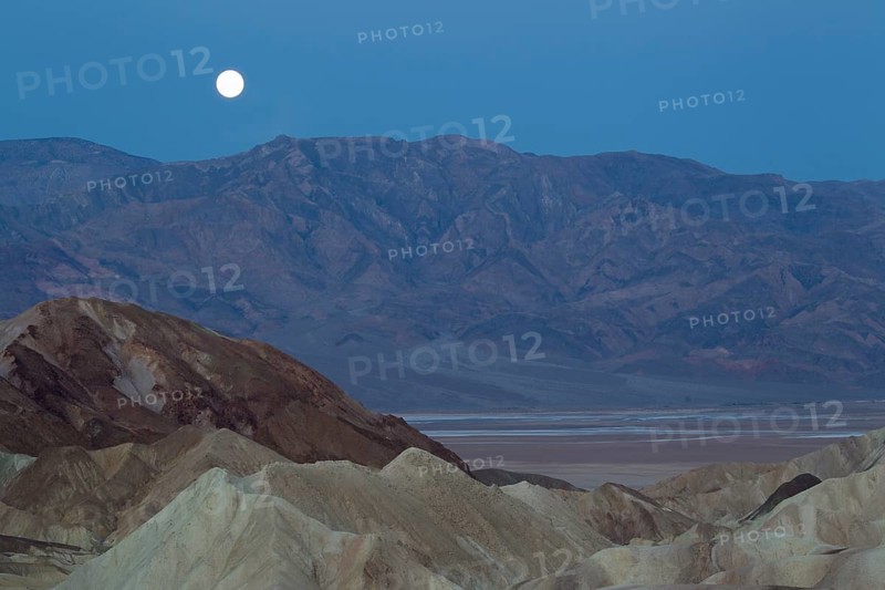 Full moon over the Panamint Range and the Death Valley at dawn