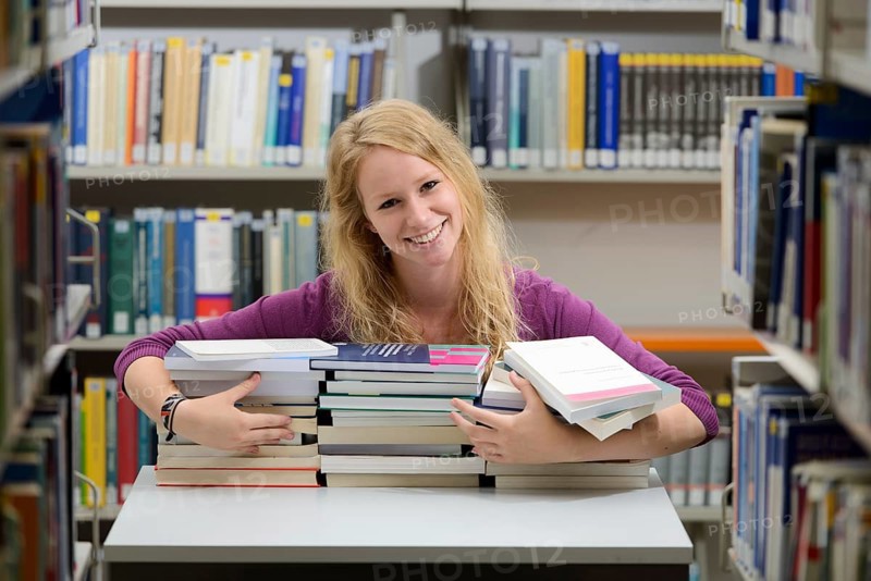 Student studying in the departmental library of the University of Hohenheim in Schloss Hohenheim Palace