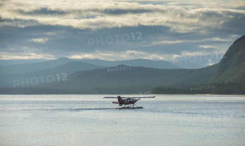 Seaplane taking off from Saggat Lake near Arrenjarka island