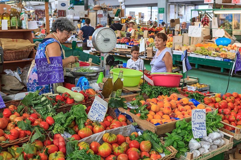 Market stall with fruit and vegetables in the market hall of Sanremo