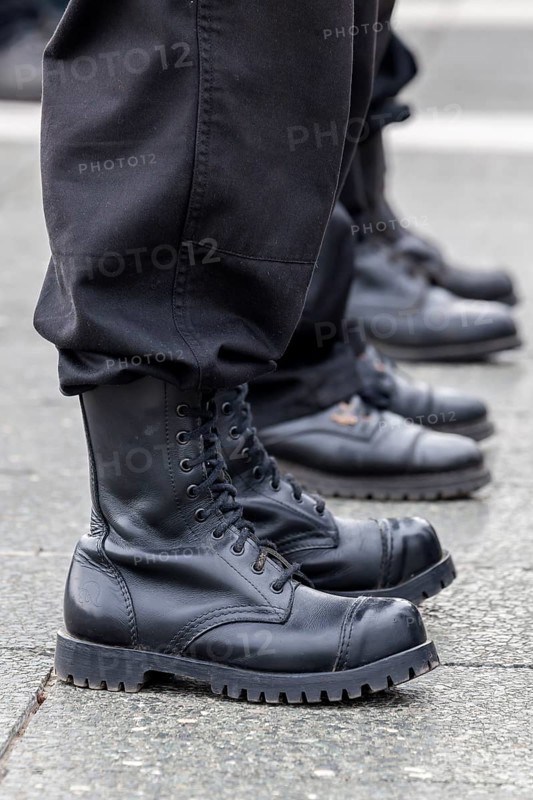 Members of a right-wing Hungarian party wearing combat boots