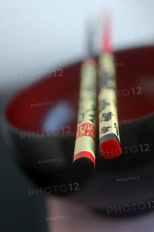 Laquered rice bowl and chop sticks with kanji