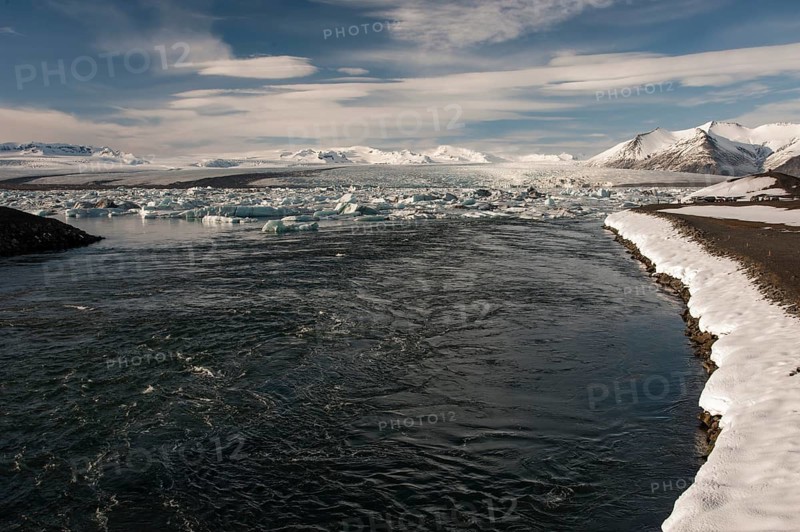 View of the Jokulsarlon glacier lagoon from the bridge over the lake outlet