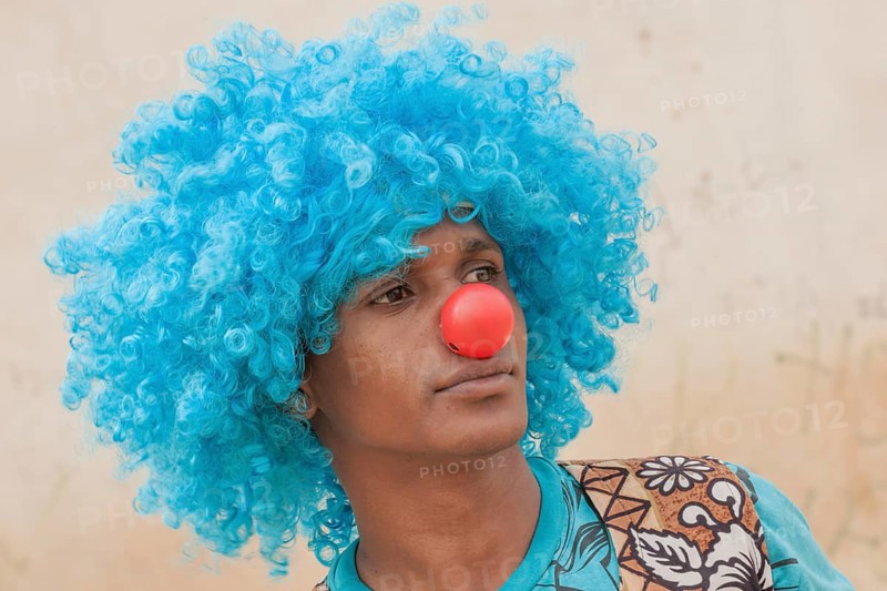 Member of a carnival club in the slums of Ribeira Bote