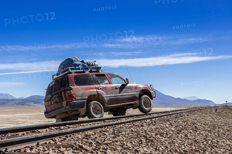 Car crossing railroad tracks